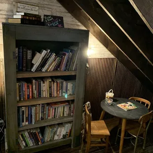 Books to read and kids coloring area.