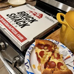 Large pepperoni and pineapple pizza