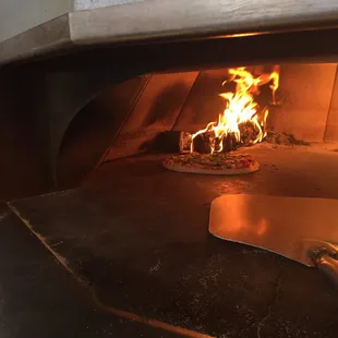 a pizza being cooked