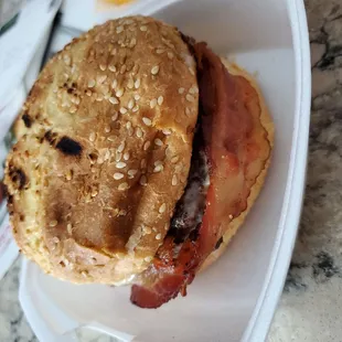 Cheeseburger on a bun with bacon