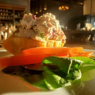 New Chicken Salad served in a fried Flour Tortilla Bowl with Tomatoes and Spinach on the side is the perfect light lunch meal.