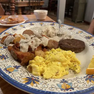 Biscuits, gravy, eggs, and sausage Yum