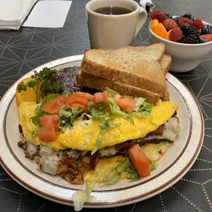 Bacon Cheeseburger Omelet with the obligatory sausage patty. So so good. They aren't afraid to customize.