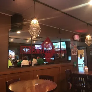 the interior of a brick street tavern