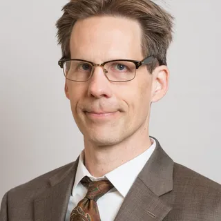 John B.