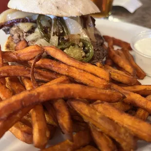 Jalepeno bacon cheeseburger with sweet potato fries