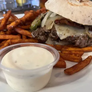 Jalepeno bacon cheeseburger with sweet potato fries