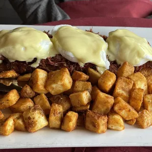 Eggs Benedict with corn beef hash