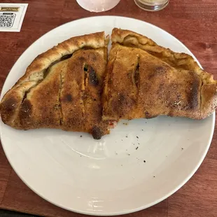 Calzone with pepperoni, Italian sausage &amp; jalapeños