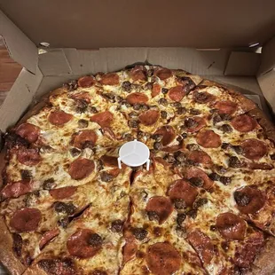 Large pepporni sausage with extra cheese well done