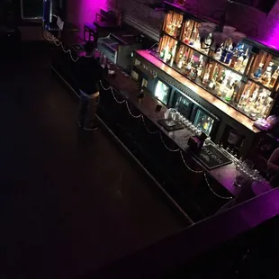 a bar with purple lighting