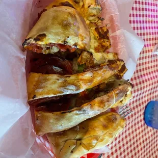  plate of food on a checkered tablecloth