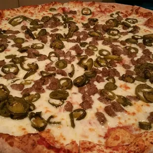Large sausage/jalapeno pizza.