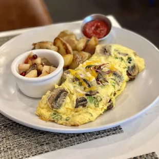 Forest omelette, one of four on brunch menu, delicious, light and fluffy. Excellent!
