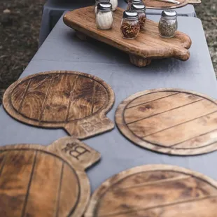 wooden pizza boards on a table