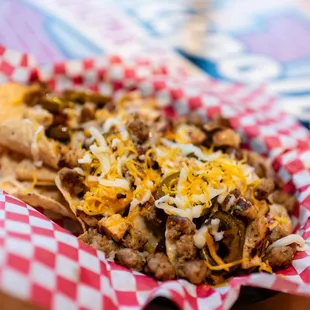 a basket of nachos on a table