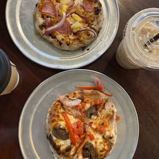 two pizzas and a drink
