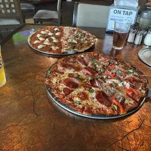 Two 1/2 and 1/2 large pizzas. So...got to try four in total.