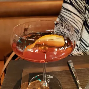 a glass filled with a drink