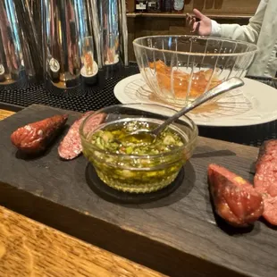 House made lil' smokies with chimichurri.