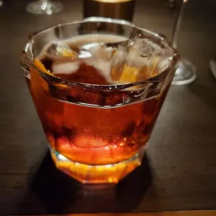a glass filled with a drink