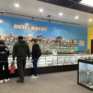 Check out area and class cases with figurines from shows, movies, musical artists etc