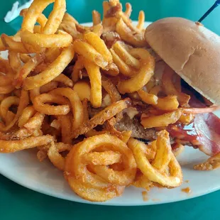 Bricks Burger 1/2 # with bacon, barbecue sauce, coleslaw. They don't skimp on curly fries.