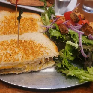 Grilled cheese and fried green tomato with a side salad