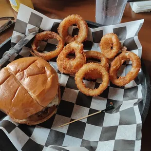a burger and onion rings