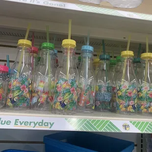 a shelf full of soda bottles