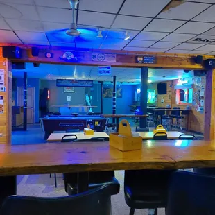 a bar with neon lights