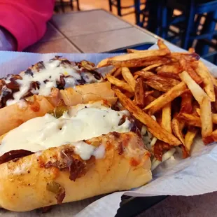 two hotdogs and french fries