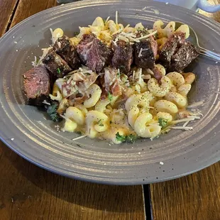 Mac n cheese with bacon with the steak add on option