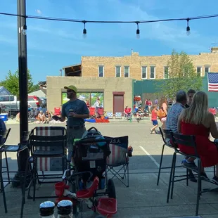 Parade viewing in air conditioning with drinks &amp; snacks!!
