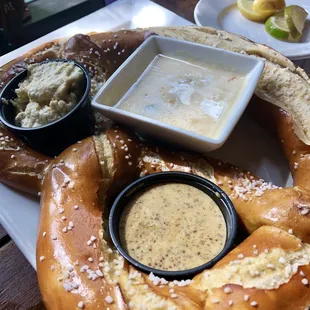 Giant pretzel with dipping sauces