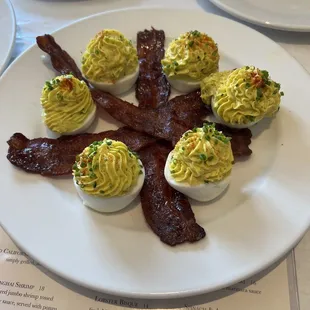 Deviled eggs with Millionaire&apos;s bacon