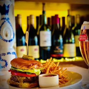 a burger and fries on a plate