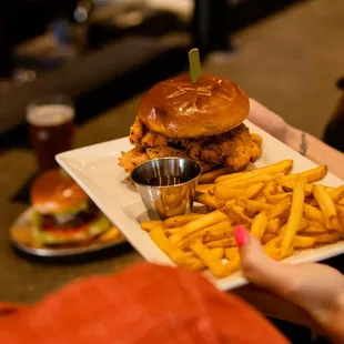 a woman holding a plate of food