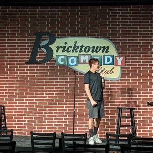 a man standing on stage