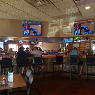people sitting at the bar