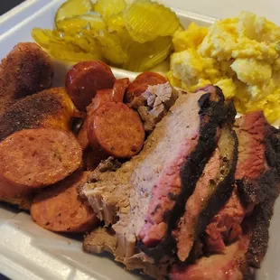 Chicken, sausage,  brisket,  and tater salad.