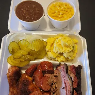 Beans, creamed corn, potato salad,quarter chicken, sausage, brisket, plus a $1.39 credit card processing fee. Total price $39.01