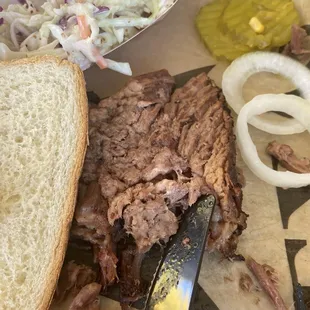 Flavorless dry brisket and dry bread