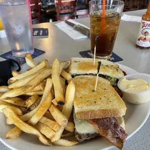 a sandwich and fries on a plate