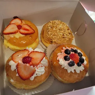 4 special donuts including pb &amp; j, strawberry and cream, Strawberry and custard, and Berry &amp; cream