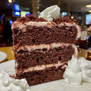 Slice of Red Velvet Cake with Cream Cheese Frosting