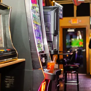 a man playing a slot machine