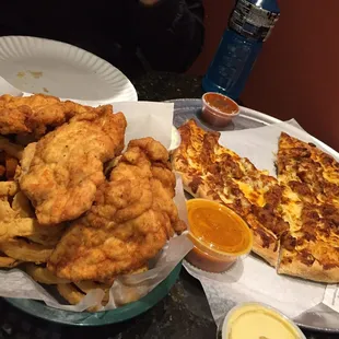 Small buffalo chicken pizza and a chicken finger dinner.