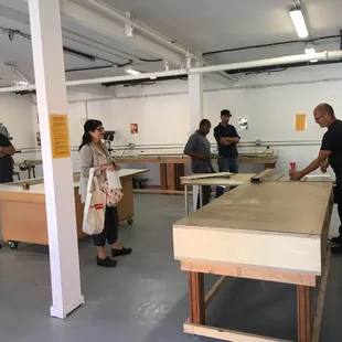 Co-Workers need to pass a certification training to use the Woodshop - here's a diverse group at the October training.