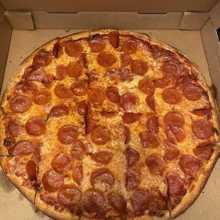 a pepperoni pizza in a box